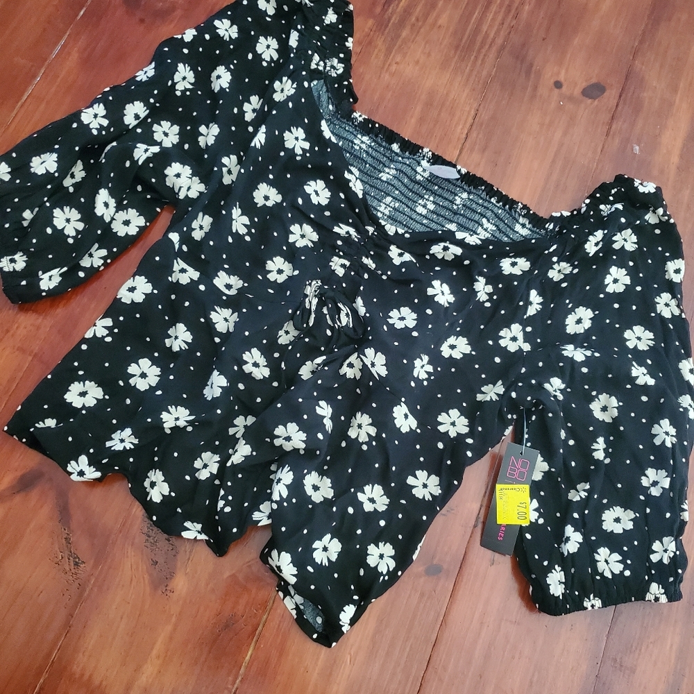 Sold. No boundaries floral top